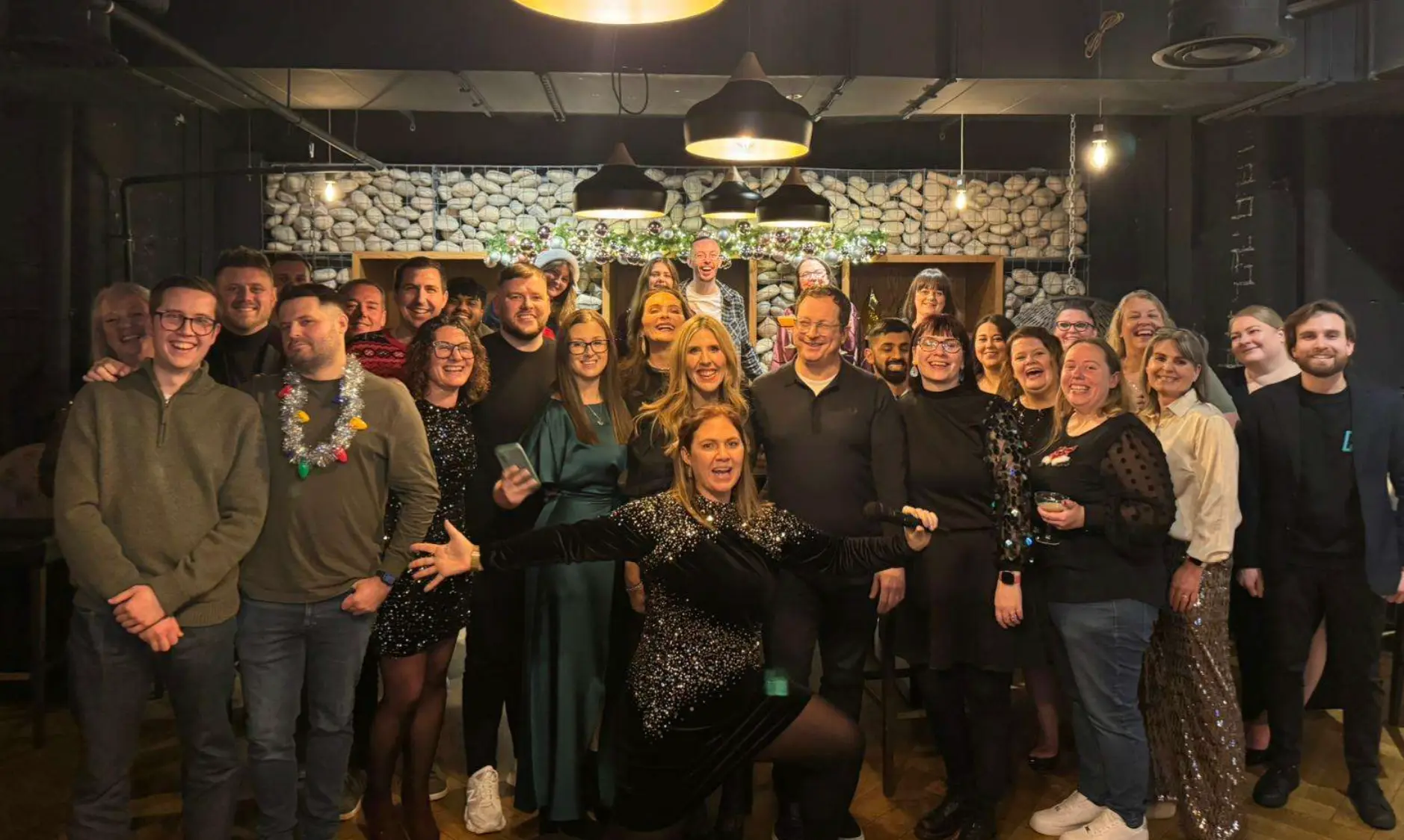 PayCaptain team and customers at a company event